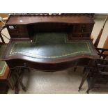 A MAHOGANY REPRODUCTION LADIES WRITING DESK WITH SEVEN DRAWERS