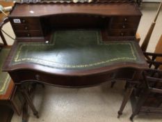 A MAHOGANY REPRODUCTION LADIES WRITING DESK WITH SEVEN DRAWERS