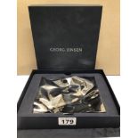 A GEORG JENSON STAINLESS STEEL CRASH TRAY PART OF THE MASTERPIECES COLLECTION, IN ORIGINAL BOX, 15CM