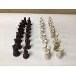 A SET OF CARVED CHESS MINIATURE ORIENTAL RELATED FIGURES IN RESIN 32 PIECES