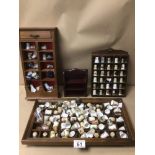 A LARGE COLLECTION OF MOSTLY PORCELAIN THIMBLES, INCLUDES ROYAL CROWN DERBY, BIRCHCROFT, AND MORE