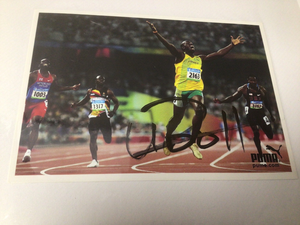 A PHOTOGRAPH ALBUM OF CELEBRITIES CONTAINING THEIR AUTOGRAPHS INCUDES JAMES EARL JONES, USAIN BOLT - Image 8 of 19