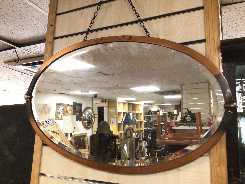 AN ART NOUVEAU OVAL COPPER MIRROR WITH BEVELLED GLASS A/F, 71 X 42CM - Image 2 of 3