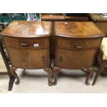 A PAIR OF VINTAGE BEDSIDE CHESTS ON CABROILE LEGS