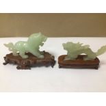 TWO CARVED JADEITE ANIMALS ON STANDS