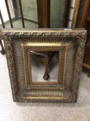 AN EARLY GILDED PICTURE FRAME, 47 X 53CM