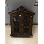 A SMALL WOODEN CABINET WITH GLASS FRONT DOORS, 64 X 50 X 15CM