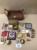 A SMALL BOX OF COLLECTABLES INCLUDES PATCHES, MINIATURE FIGURINES, AND MORE