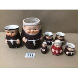 A GRADUATED SET OF GOEBEL WEST GERMANY MONK JUGS