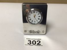 A MODERN 925 SILVER QUARTZ MINIATURE CLOCK, 7 X 5CM