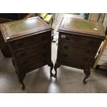 A PAIR OF GREEN LEATHER TOP FOUR DRAWERS CHESTS ON CABRIOLE LEGS, 73 X 43 X 32 CM