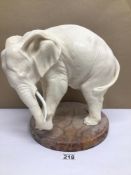 A LARGE MOULDED WHITE ELEPHANT, 32CM HIGH