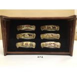 A BOXED SET OF FRANKLIN MINT KNIVES DECORATED WITH ANIMALS