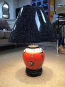 A VINTAGE CERAMIC TABLE LAMP ORANGE WITH FLOWERS AND BUTTERFLIES DECORATION, 64CM HIGH