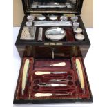 A VICTORIAN ROSEWOOD AND FOLIATE ENGRAVED BRASS BOUND RECTANGULAR TRAVELLING TOILET BOX, THE