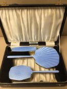 A VINTAGE ENGLISH CASED VANITY SET WITH BLUE GUILLOCHE ENAMEL FITTED ON CHROMIUM PLATED 30CM X 21CM