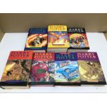 SEVEN HARRY POTTER BOOKS BY J.K. ROWLING MOST FIRST EDITIONS