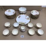 THIRTY-FIVE PIECE CRESCENT CHINA (RN122293) GILDED EDGED AND DECORATED WITH FLOWERS