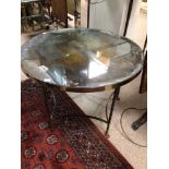 A HEAVY REGENCY ROUND TABLE WITH ORNATE LEGS AND CLAW FEET, MERCURY GLASS TOP NEEDS (RE-SILVERING)