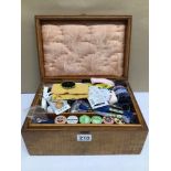 A TWO-TIER WOODEN SEWING BOX, WITH CONTENTS, 33CM X 23CM X 15CM