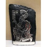 A D’ARGENTA WHITE METAL WALL PLAQUE OF A MAYAN KING, IN A KNEELING POSITION WITH HIEROGLYPHICS