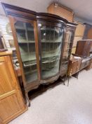 A LARGE VICTORIAN MAHOGANY DISPLAY CABINET BOW FRONTED DOOR WITH GREEN VELVET AND BOTTOM DRAWER, 131