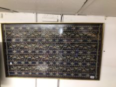 A FRAMED AND GLAZED VINTAGE PIECE OF INDIAN FABRIC, 100 X 81CM