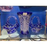 THREE LARGE BLUE CUT GLASS ITEMS, VASE WITH TWO BASKETS, 26 X 19CM