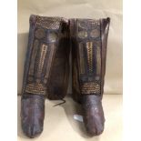 A PAIR OF VINTAGE LEATHER CHAPS/BOOTS