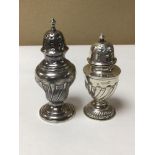 TWO VICTORIAN HALLMARKED SILVER WRYTHEN BALUSTER PEPPER POTS, THE LARGEST 9.5CM, 67G COMBINED