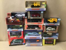 A MIXED COLLECTION OF DIE-CAST MODEL CARS IN BOXES, INCLUDES DINKY, MATCHBOX, AND MORE