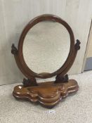 A VICTORIAN MAHOGANY SWING MIRROR WITH COMPARTMENT