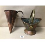 A VINTAGE COPPER POURER WITH A SMALL COPPER BUCKET WITH BRASS HANDLE