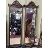 A PAIR OF OAK FRAMED BEVELLED WALL MIRROR, 153 X 49CM