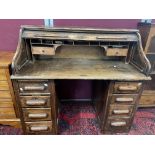 ART DECO DESK IN OAK WITH TAMBOUR FRONTED TOP WITH FOUR DRAWERS EACH SIDE