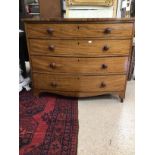 A VICTORIAN MAHOGANY BOW FRONTED FOUR DRAWER CHEST
