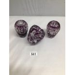 THREE BOHEMIAN VIOLET CUT GLASS PIECES, TWO VASES AND BASKET, THE LARGEST 11 X 11CM