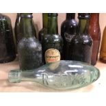 A QUANTITY OF EARLY GLASS BOTTLES, GORDON GIN, CONSTABLE AND SONS, R FRY AND CO AND MORE