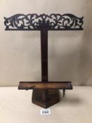 A 19TH CENTURY ROSEWOOD ADJUSTABLE MUSIC/BOOK STAND WITH DETAILED FRETWORK, 37CM