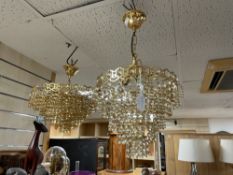 A PAIR OF GLASS AND BRASS CHANDELIERS