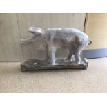 A LARGE CARVED WOODEN PIG ON STAND, 83 X 54CM
