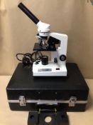 A CASED ELECTRIC MICROSCOPE BY HOWDEN AND WADE (THERMAL CONTROL)