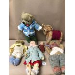 A SMALL COLLECTION OF STUFFED ANIMALS AND DOLLS