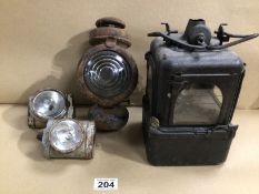 AN EARLY RAILWAY LAMP WITH ONE OTHER AND TWO BICYCLE LAMPS