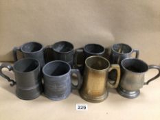 EIGHT PEWTER AND SILVER PLATE TANKARDS WITH MILITARY INSCRIPTIONS INCLUDES THE LAST DROP GLASS