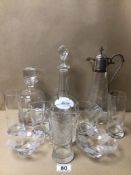 A COLLECTION OF GLASSWARE ITEMS INCLUDES TWO DECANTERS WITH STOPPERS, TWO SEPARATE MATCHING GLASSES,