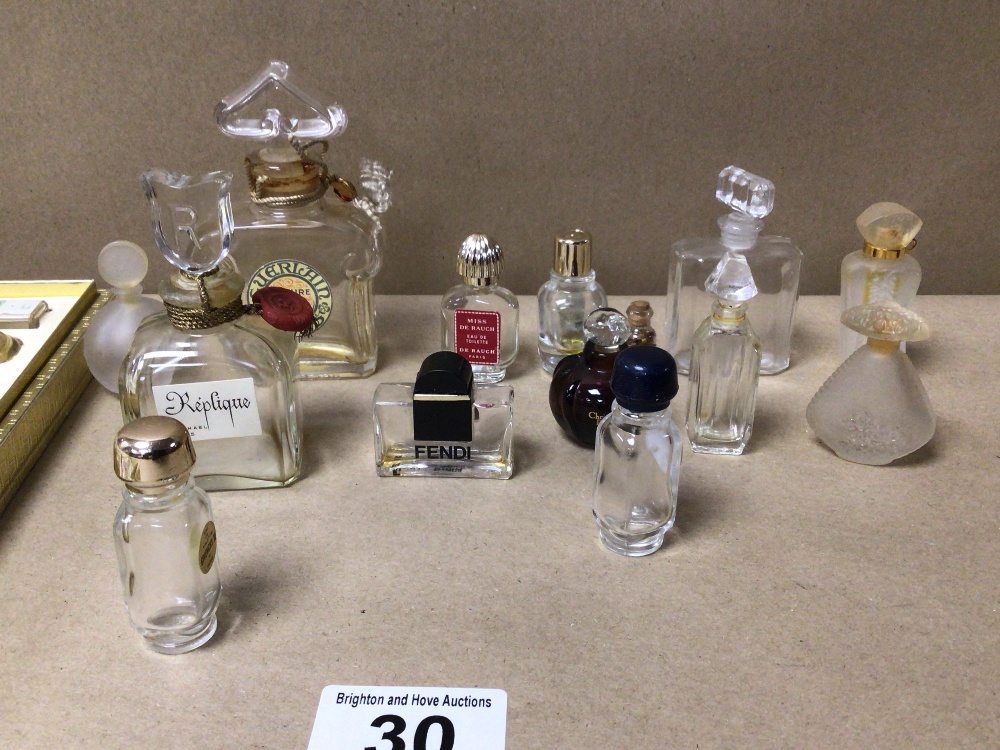 A QUANTITY OF MINIATURE PERFUME BOTTLES (EMPTY)