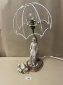 A LESSER AND PAVEY PORCELAIN FIGURAL ‘LEONARDO’ TABLE LAMP WITH A MINIATURE QUARTZ CLOCK, BOTH