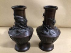 A PAIR OF ORIENTAL BRONZE VASES DECORATED WITH BIRDS, 20CM