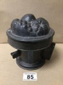 A VICTORIAN PEWTER THREE-SECTION CIRCULAR JELLY MOULD